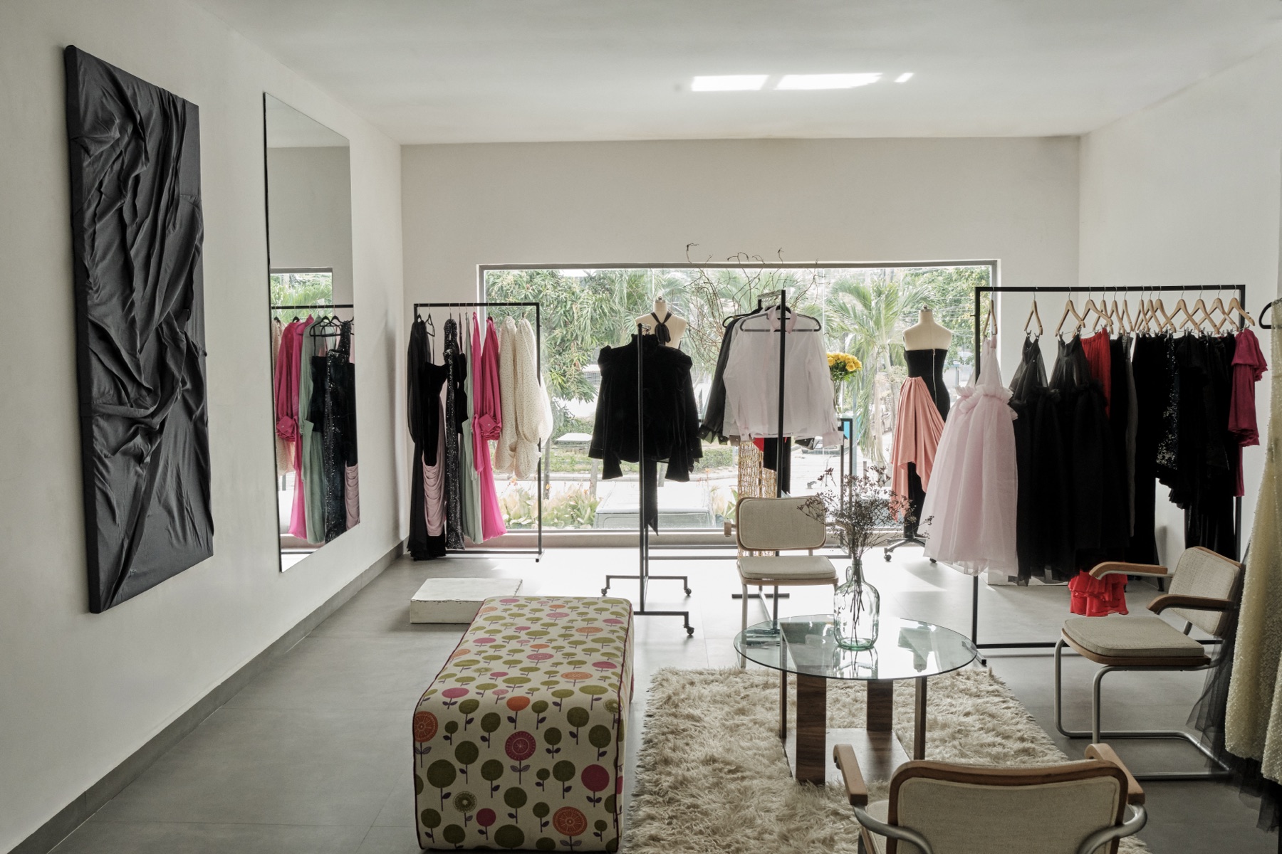 Vicnate × EBBE pop-up: rails of gowns, mannequins and a lounge corner